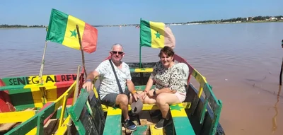 Colourful pirogue on the Pink Lake