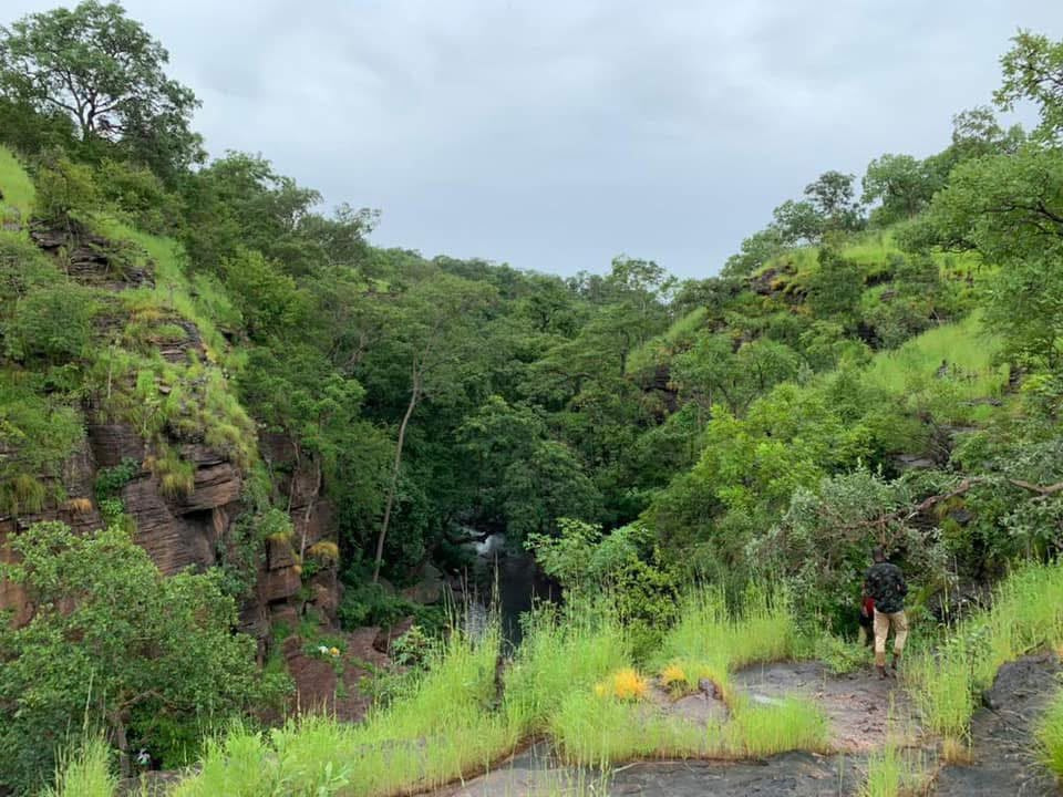 Lush gorge and waterfall in the Kédougou region