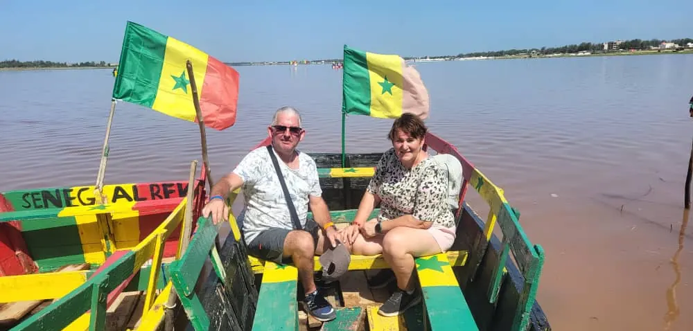 Colourful pirogue on the Pink Lake